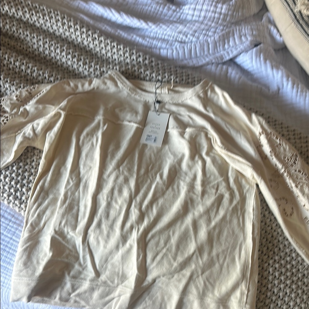 Stitch and Feather Cream Long Sleeve Top